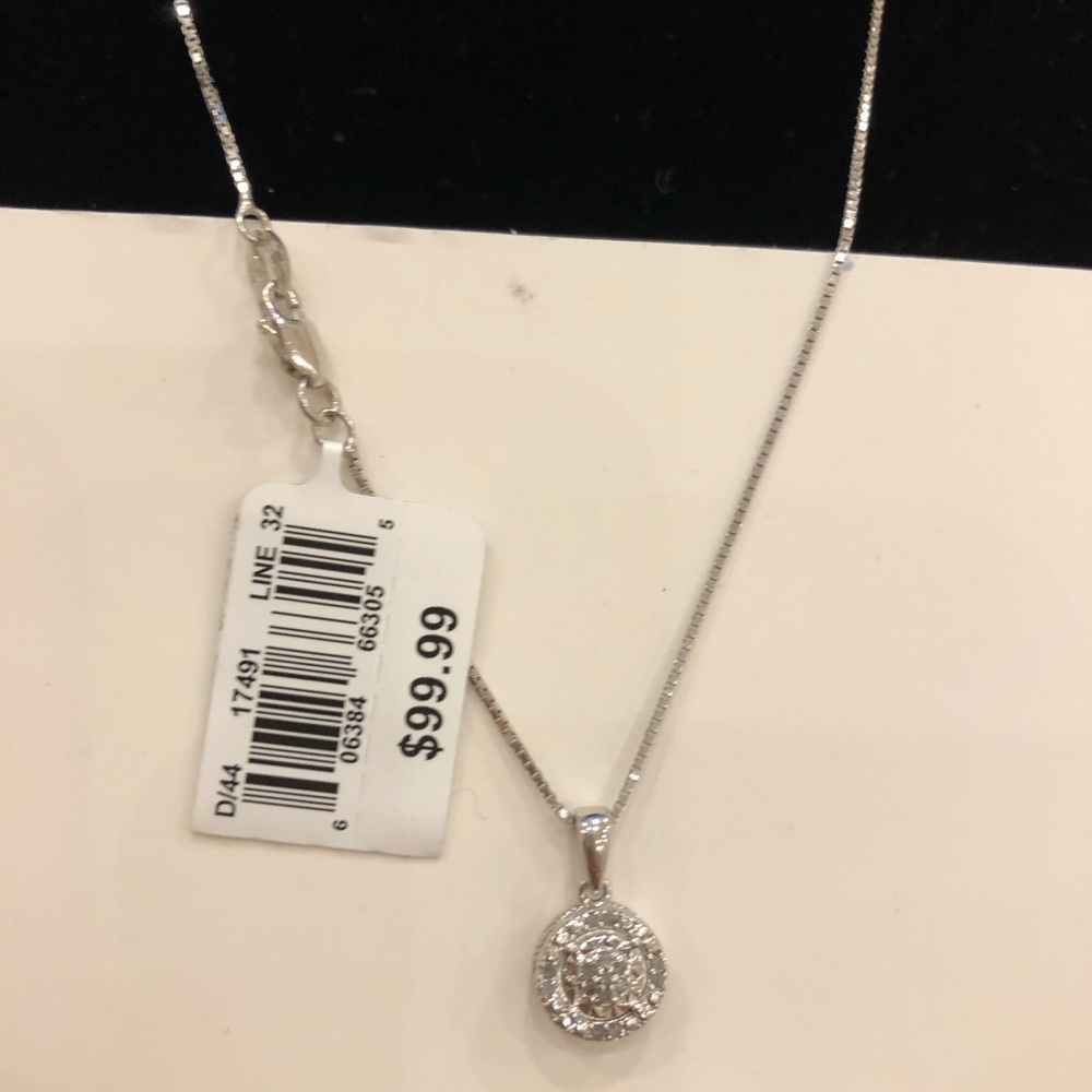 Diamond Halo Pendant. 1/10 CTTW Sterling Silver
